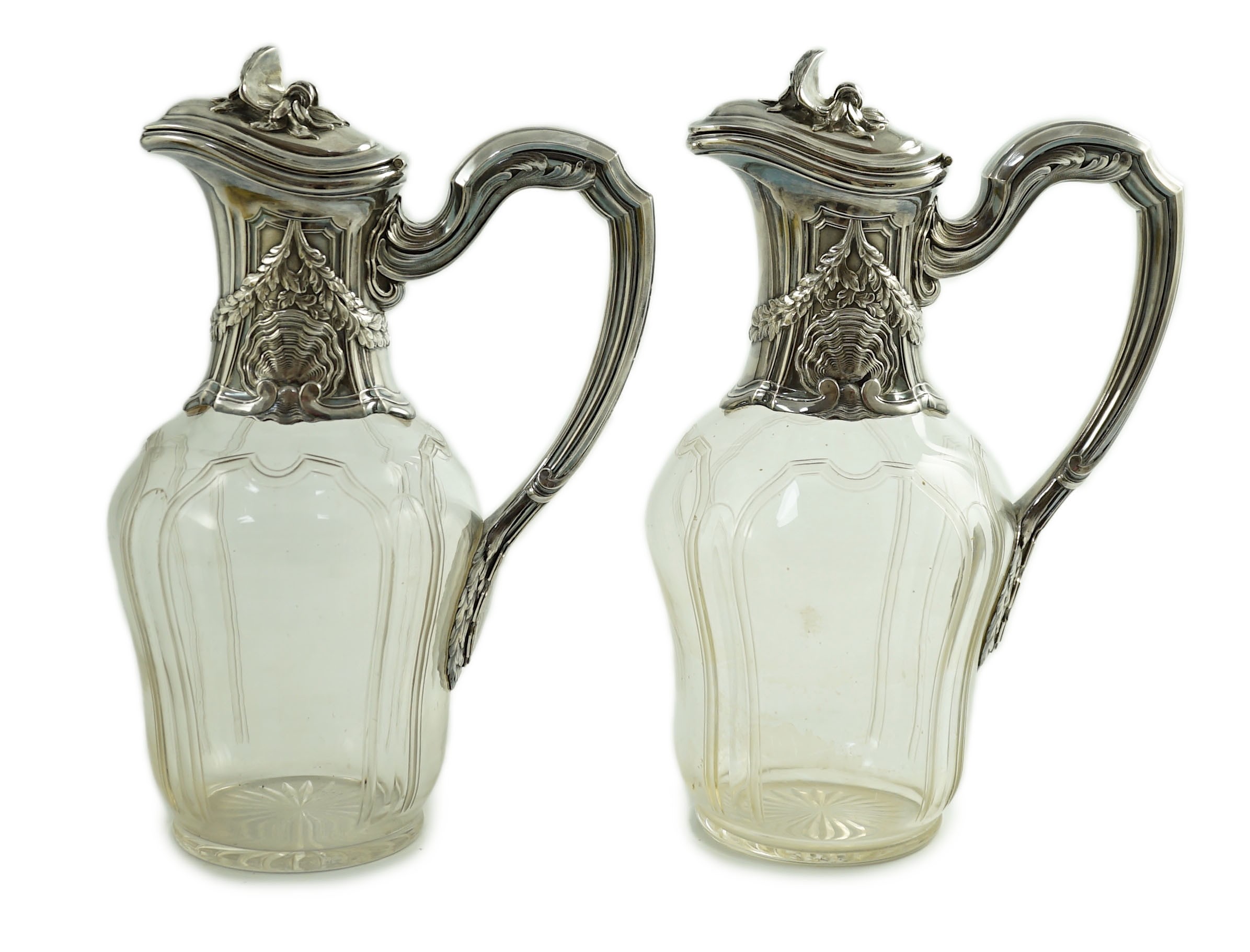 A pair of early 20th century French 950 standard silver mounted glass claret jugs, by Risler & Carre